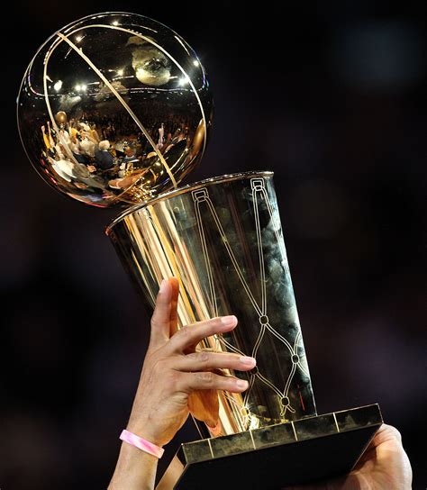 larry o'brien trophy held up.